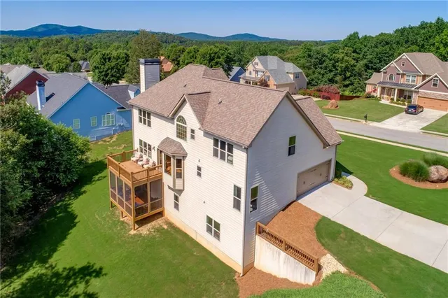 an aerial view of a house with a garden