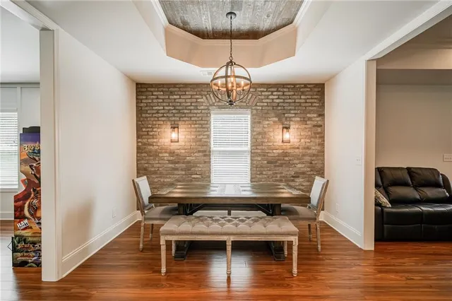 a living room with furniture or couch and a flat screen tv