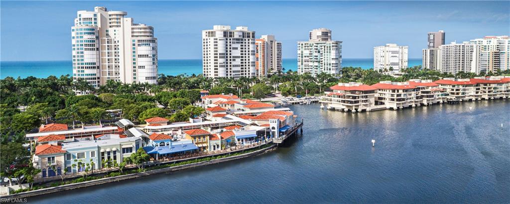 504 Turtle Hatch Road Naples, FL 34103 - Photo 4 of 5 a bed room with furniture and a large window