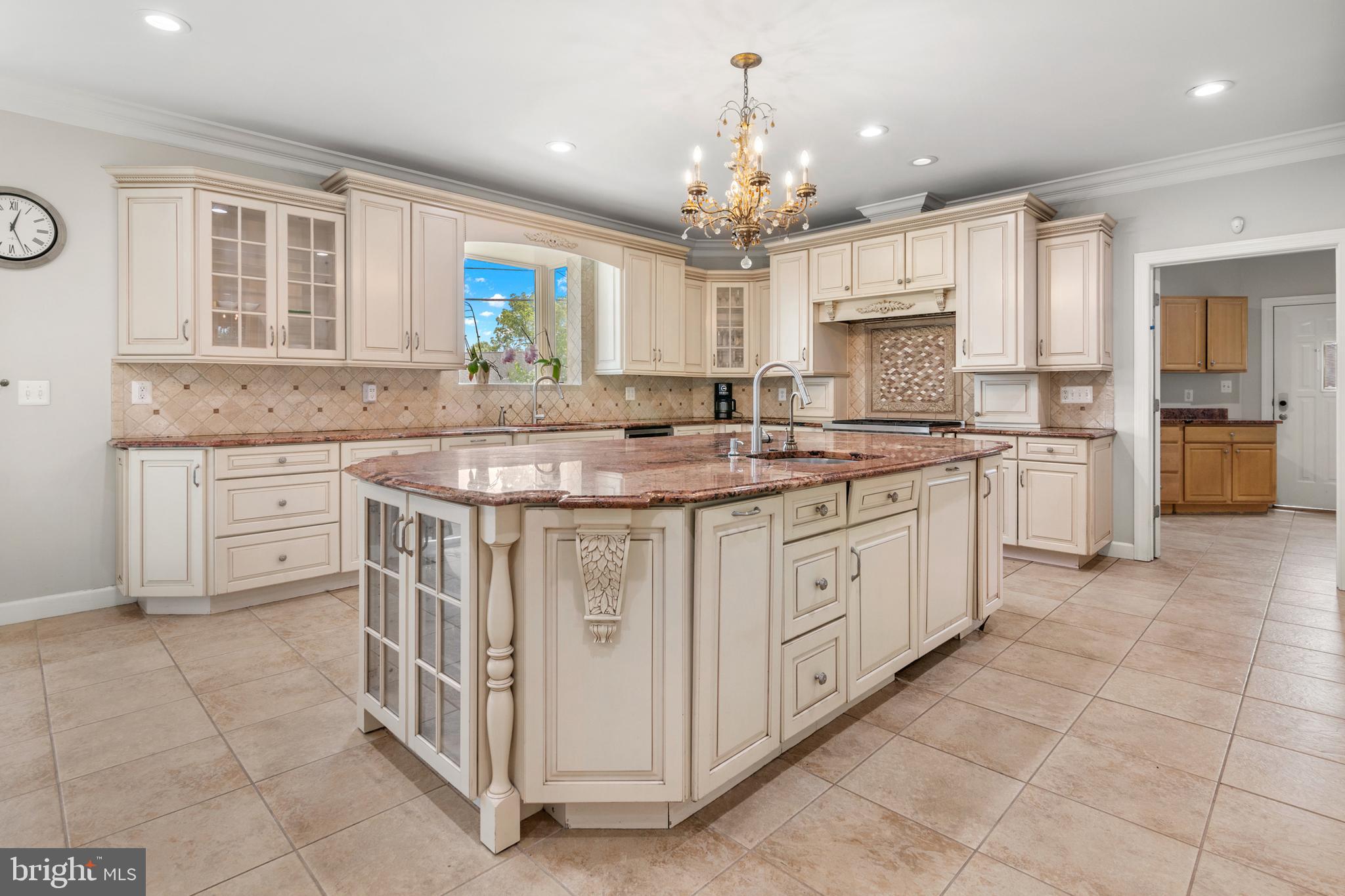 3213 Hatton Road Baltimore, MD 21208 - Photo 15 of 69 a kitchen with stainless steel appliances granite countertop a sink and cabinets