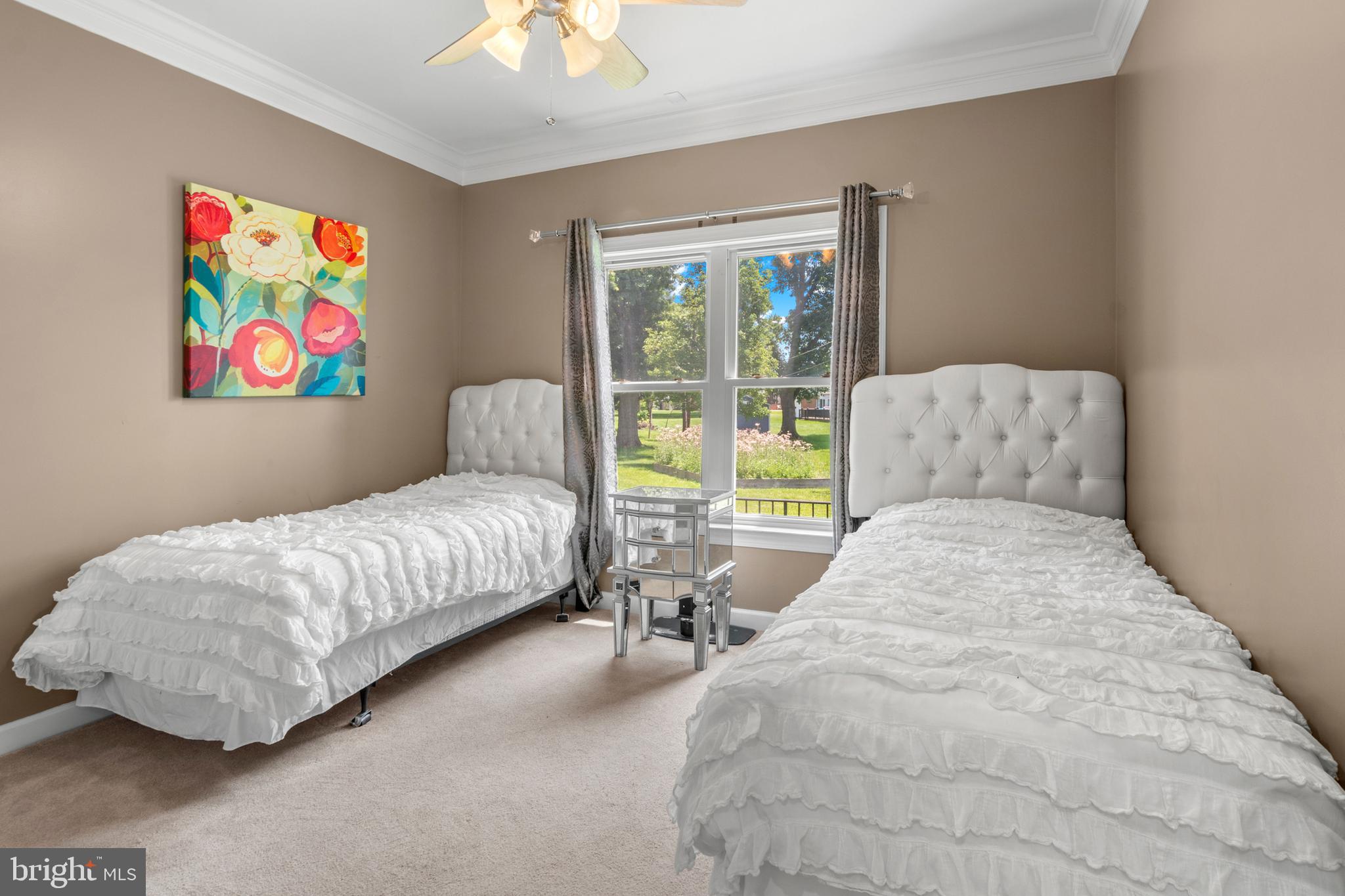 3213 Hatton Road Baltimore, MD 21208 - Photo 27 of 69 a bedroom with bed and a couch