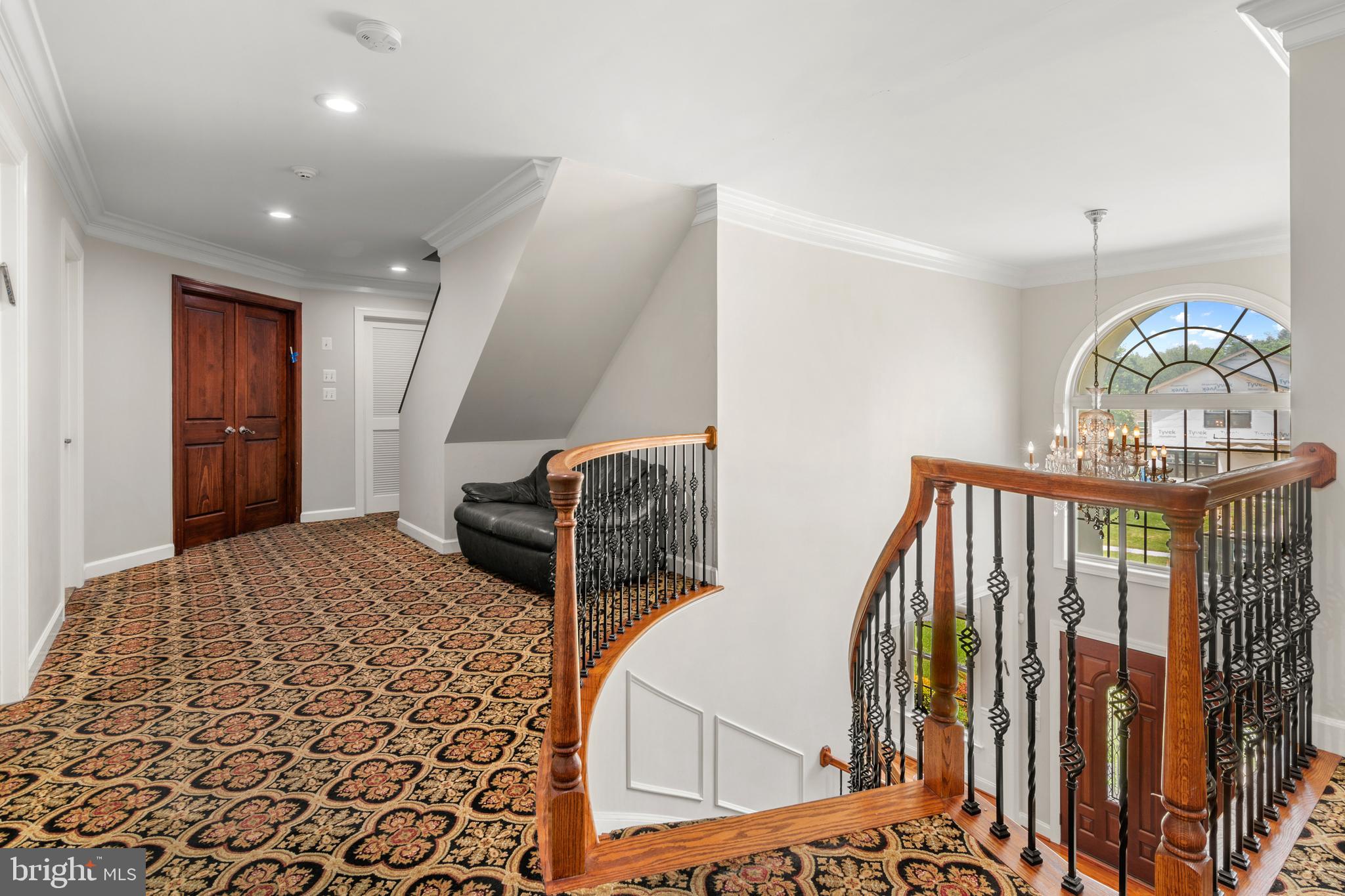 3213 Hatton Road Baltimore, MD 21208 - Photo 30 of 69 a bedroom with furniture and a wooden floor
