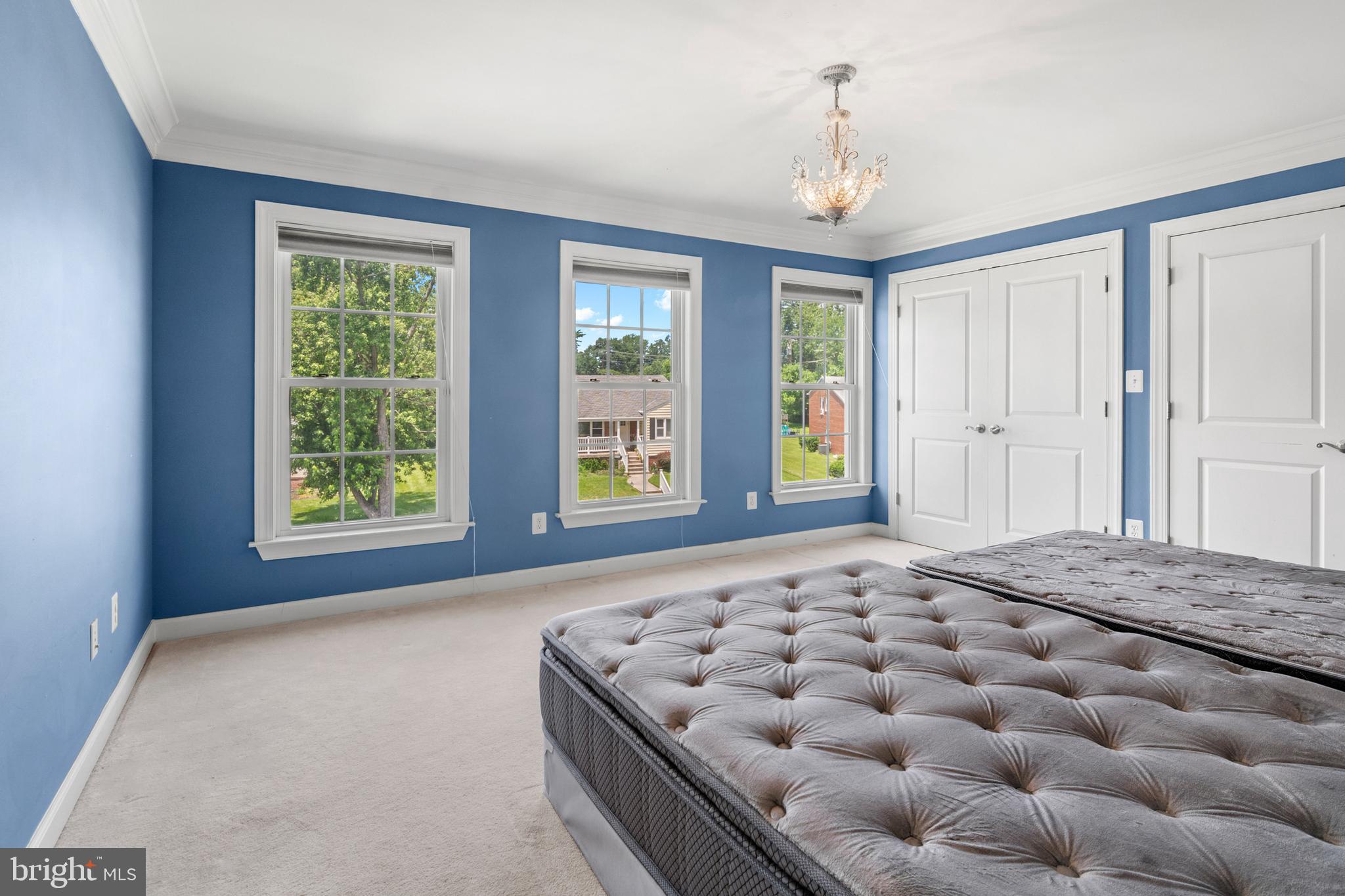 3213 Hatton Road Baltimore, MD 21208 - Photo 39 of 69 a bedroom with a bed and window