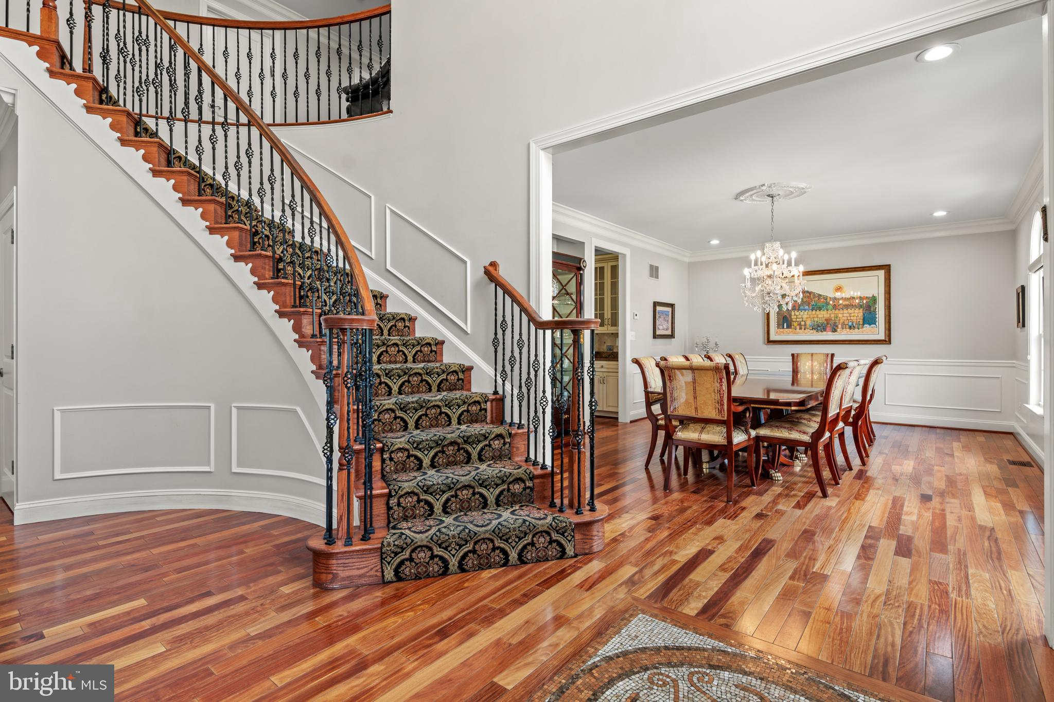 3213 Hatton Road Baltimore, MD 21208 - Photo 4 of 69 a view of entryway dining room and hall with wooden floor