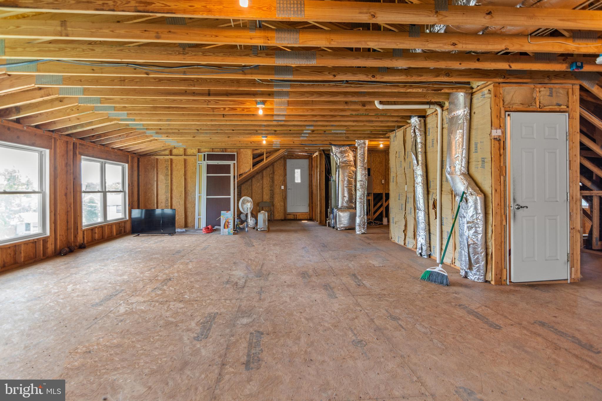 3213 Hatton Road Baltimore, MD 21208 - Photo 50 of 69 a view of a hallway with seating area