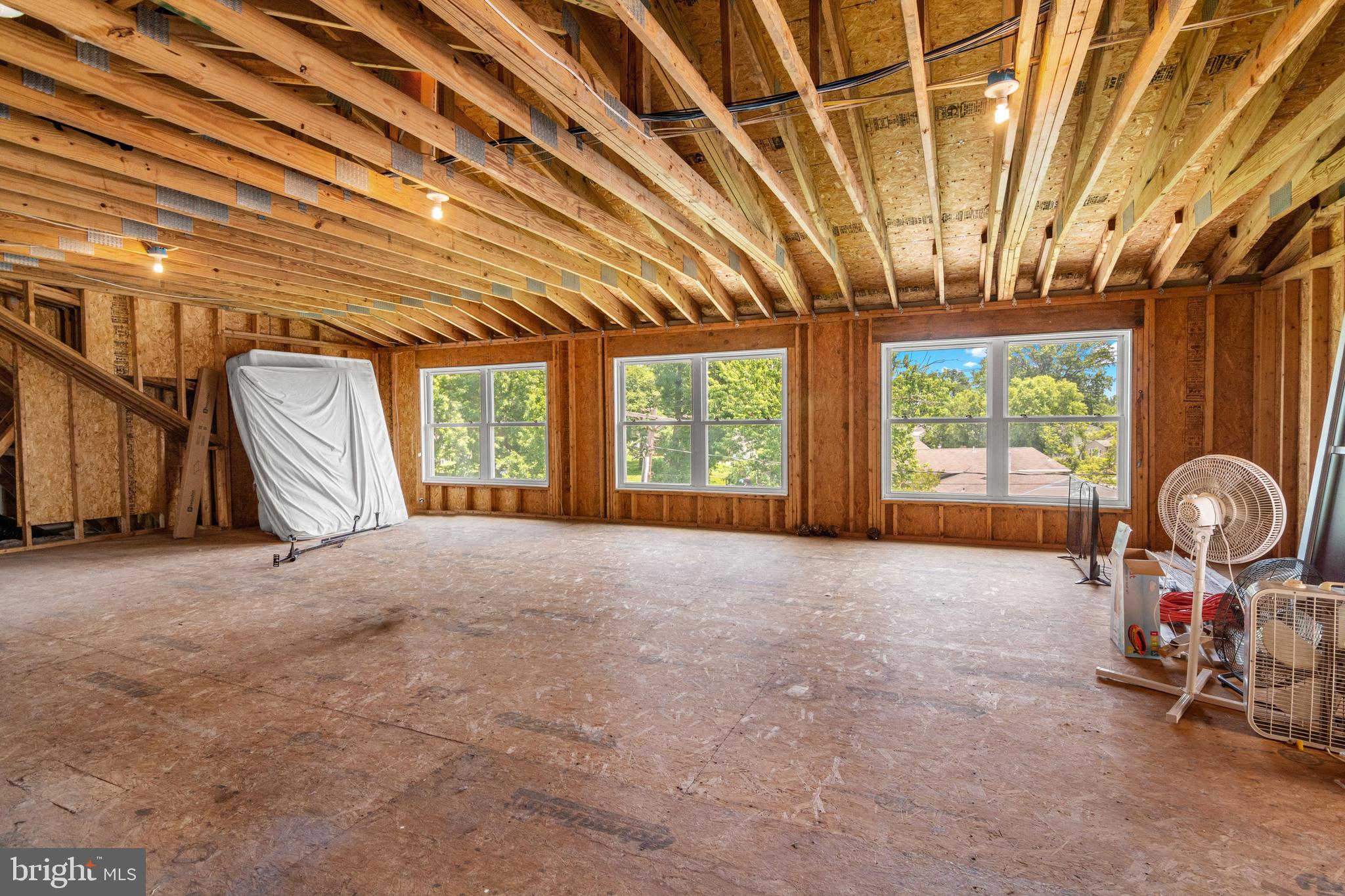 3213 Hatton Road Baltimore, MD 21208 - Photo 52 of 69 a view of a livingroom with furniture and chandelier