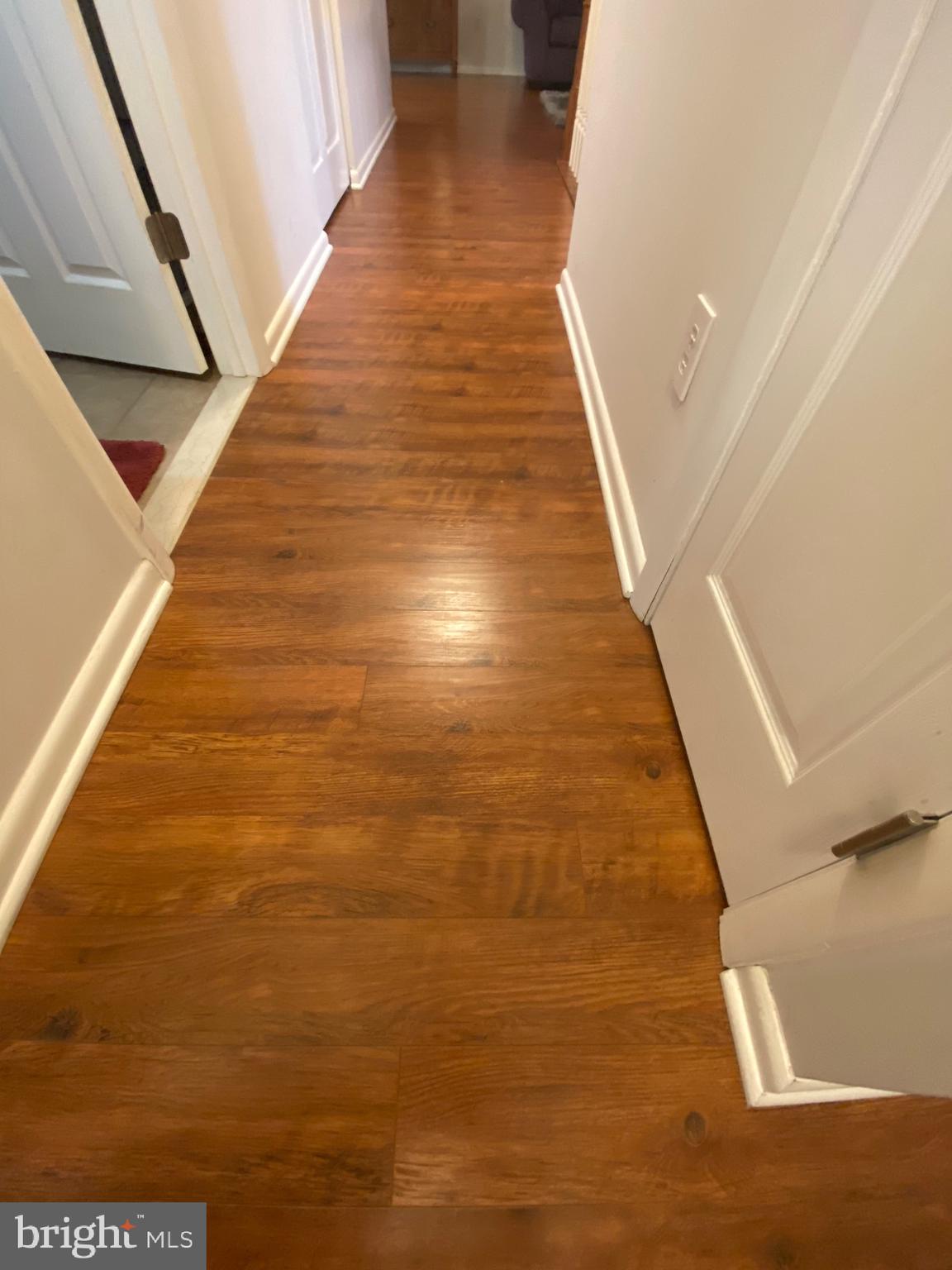 8044 Pine Ridge Road Pasadena, MD 21122 - Photo 36 of 52 wood floors upstairs