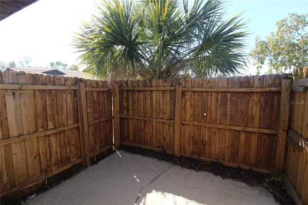 a view of a wooden fence