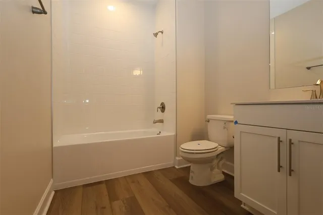 a bathroom with a toilet and a sink