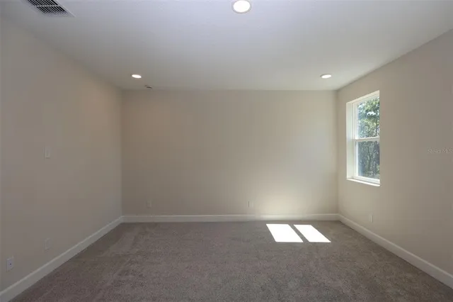 an empty room with a window