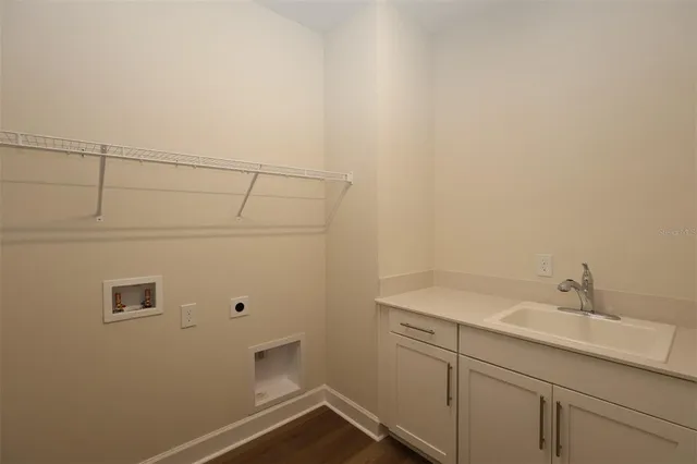 a bathroom with a sink and vanity