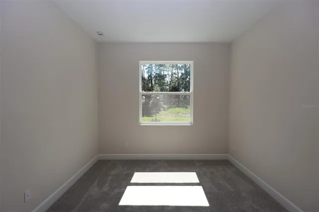 an empty room with a window