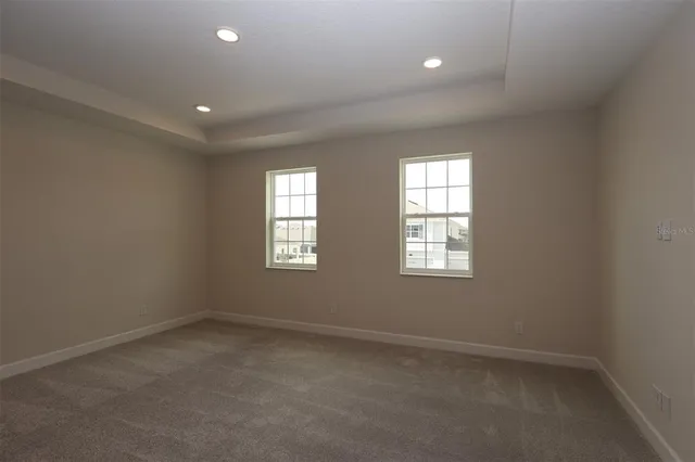 an empty room with windows