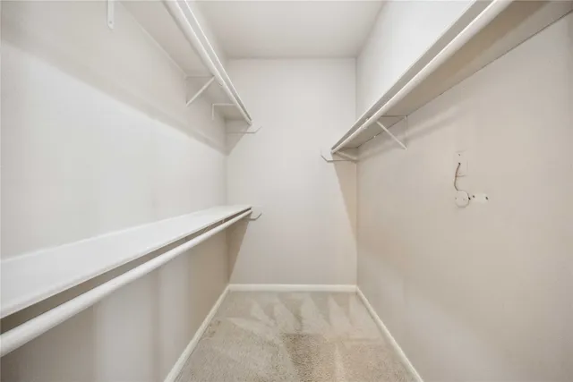 a view of small space with racks on the wall