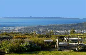 1301 Las Alturas Road Santa Barbara, CA 93103 - Photo 3 of 5 a view of a lake with lawn chairs