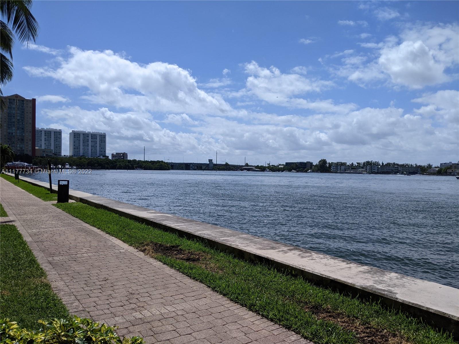 17150 North Bay Road, Unit 2814 Sunny Isles Beach, FL 33160 - Photo 14 of 25 a view of a lake with a big yard