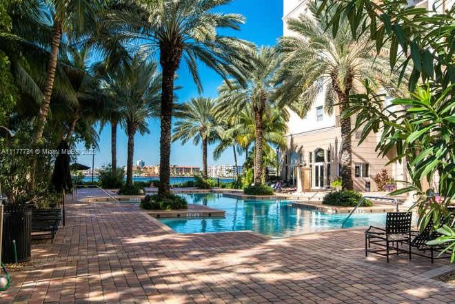 17150 North Bay Road, Unit 2814 Sunny Isles Beach, FL 33160 - Photo 9 of 25 a view of a lake with a house