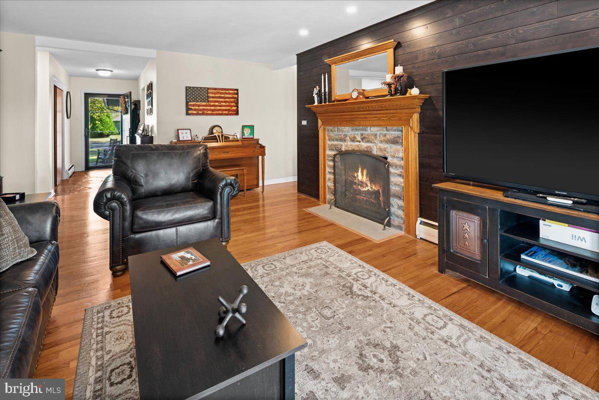 481 Federal City Road Pennington, NJ 08534 - Photo 6 of 38 a living room with furniture and a fireplace