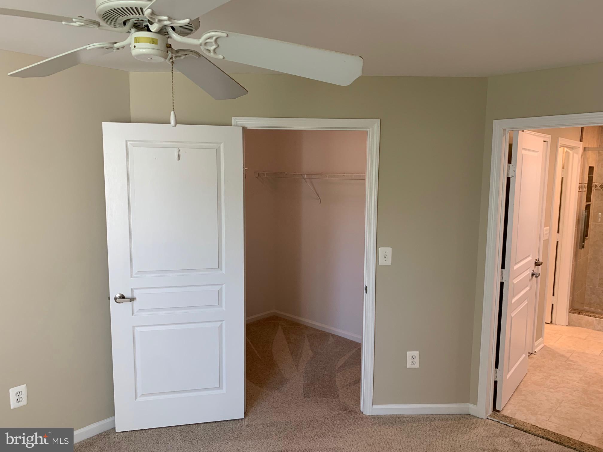 12000 Market Street, Unit 483 Reston, VA 20190 - Photo 23 of 36 Walk-in closet in Primary Bedroom