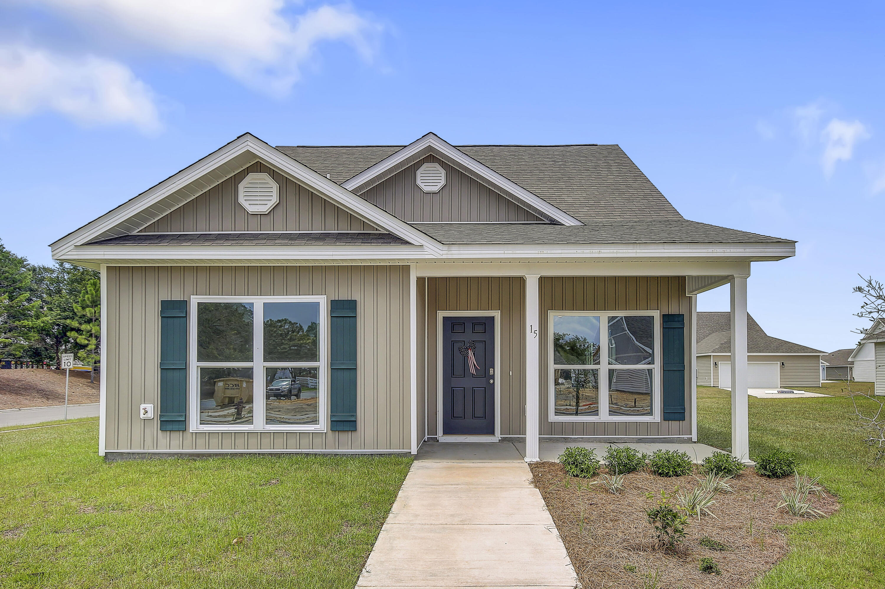 247 Staggerbush Street Freeport, FL 32439 - Photo 1 of 36 front view of a house with a yard
