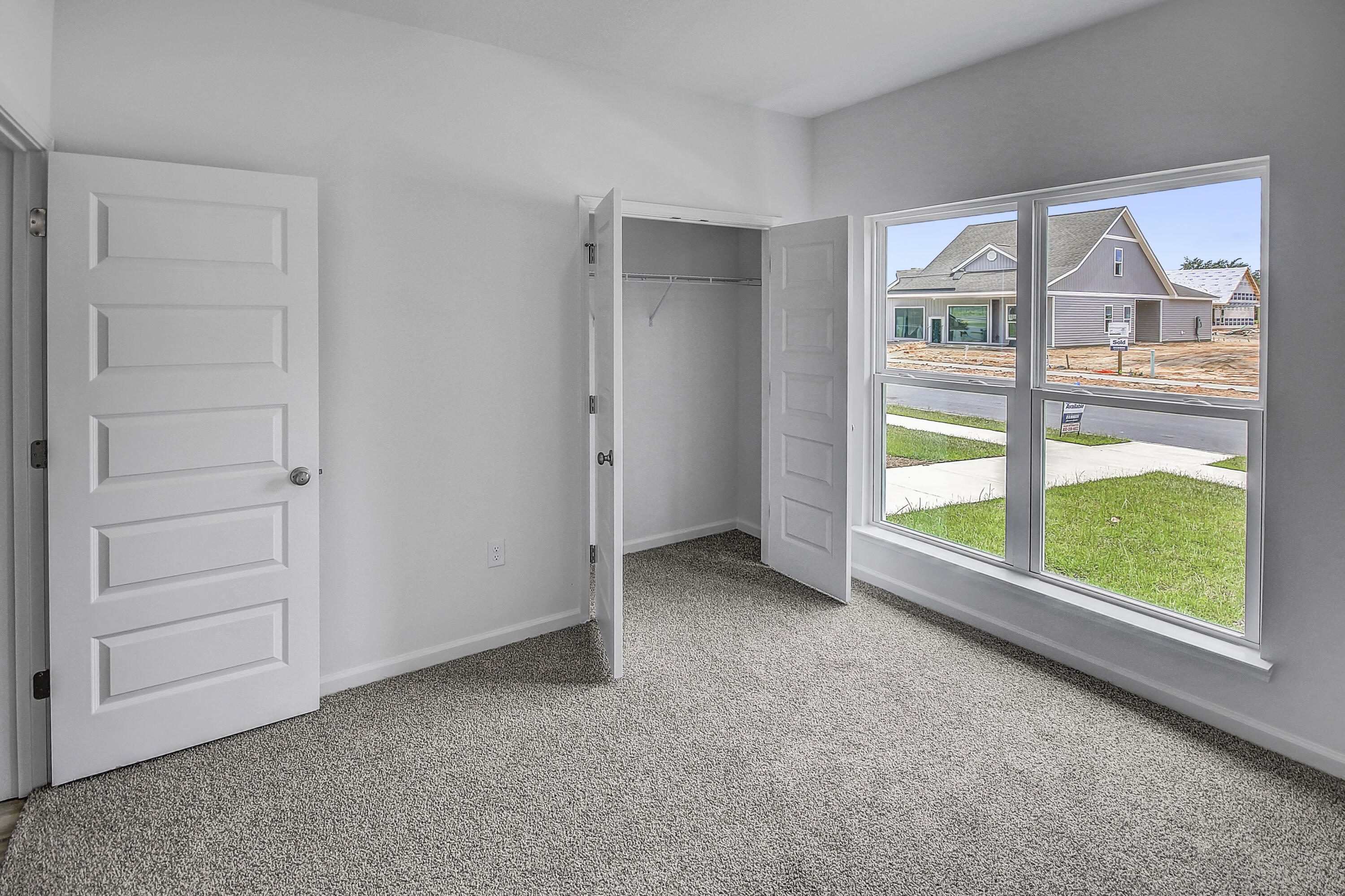 247 Staggerbush Street Freeport, FL 32439 - Photo 16 of 36 an empty room with windows
