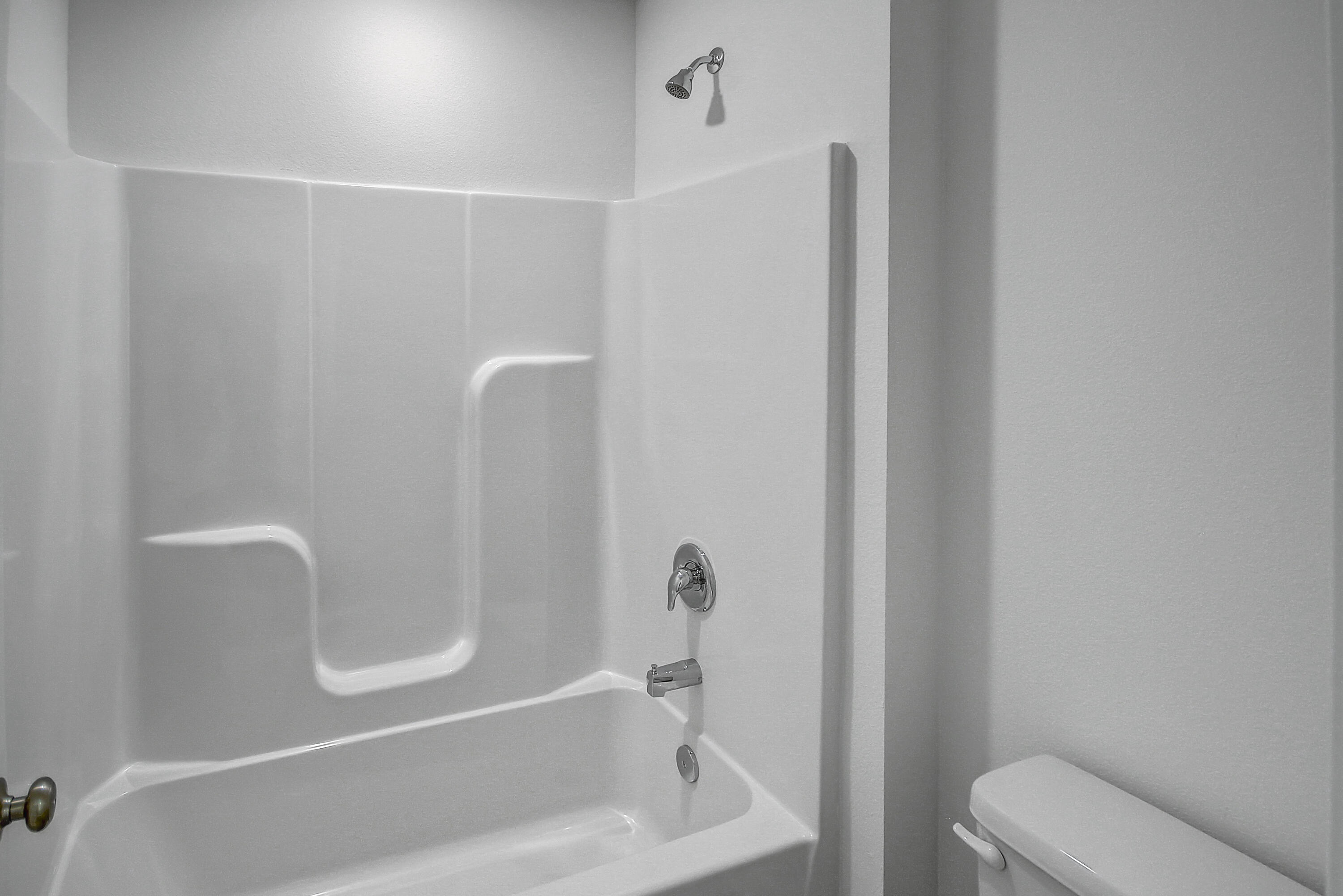 247 Staggerbush Street Freeport, FL 32439 - Photo 23 of 36 a bathroom with a shower and bathtub