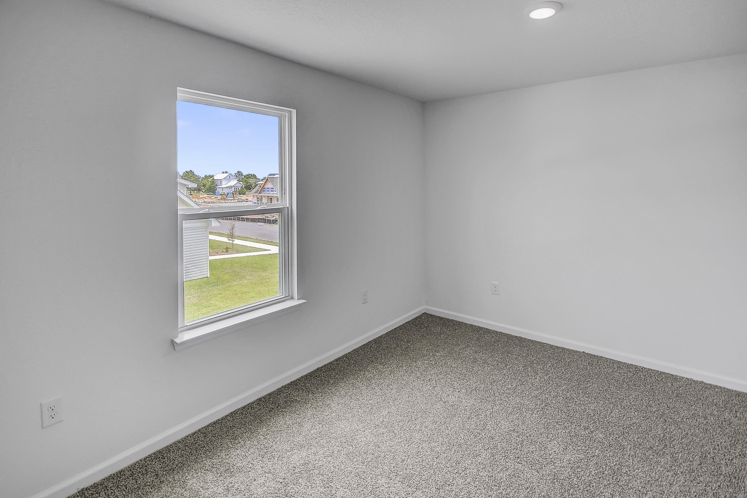 247 Staggerbush Street Freeport, FL 32439 - Photo 24 of 36 an empty room with a window