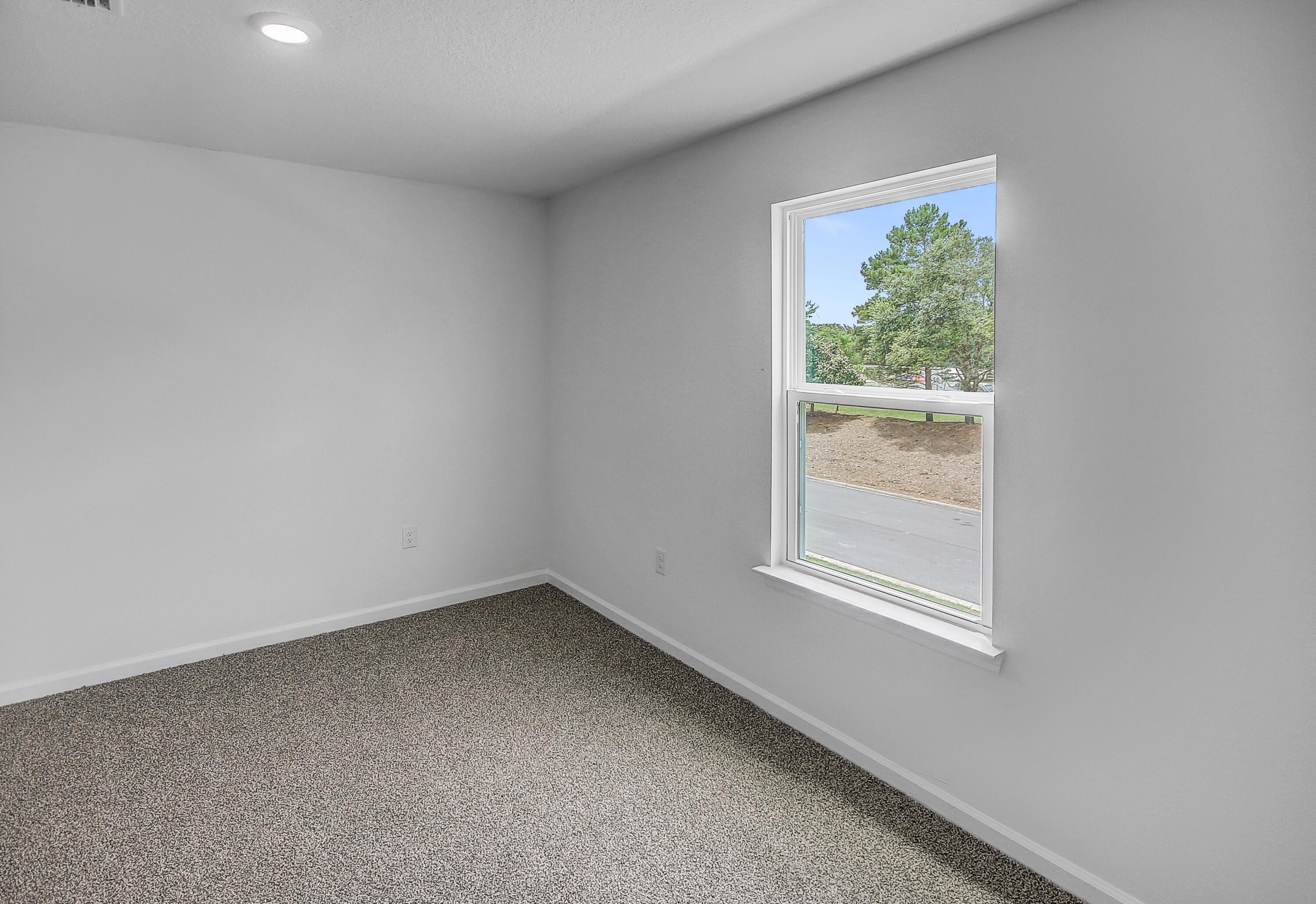 247 Staggerbush Street Freeport, FL 32439 - Photo 27 of 36 an empty room with a window