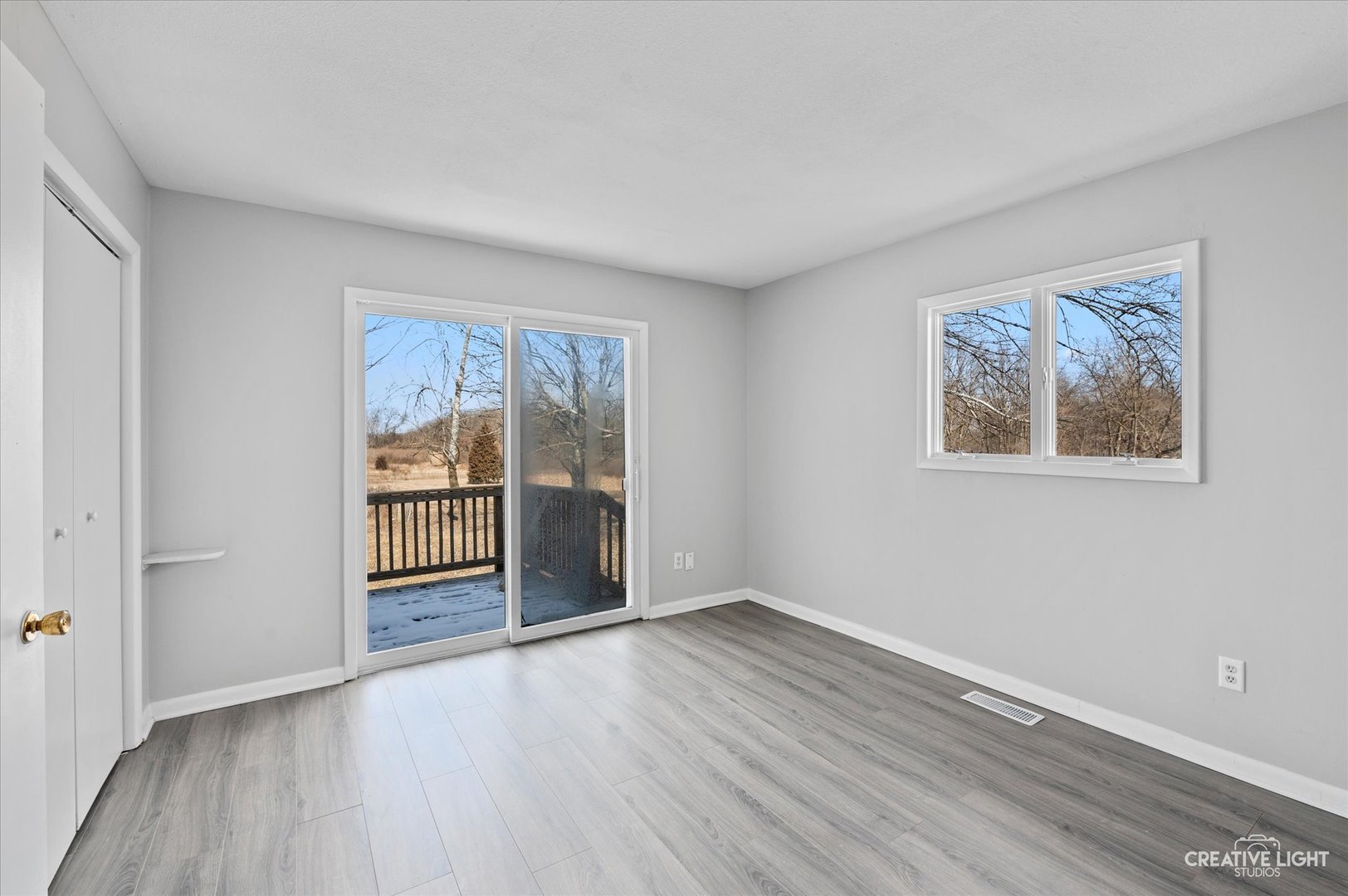 2391 North 24th Road Marseilles, IL 61341 - Photo 12 of 24 a view of an empty room with wooden floor and a window