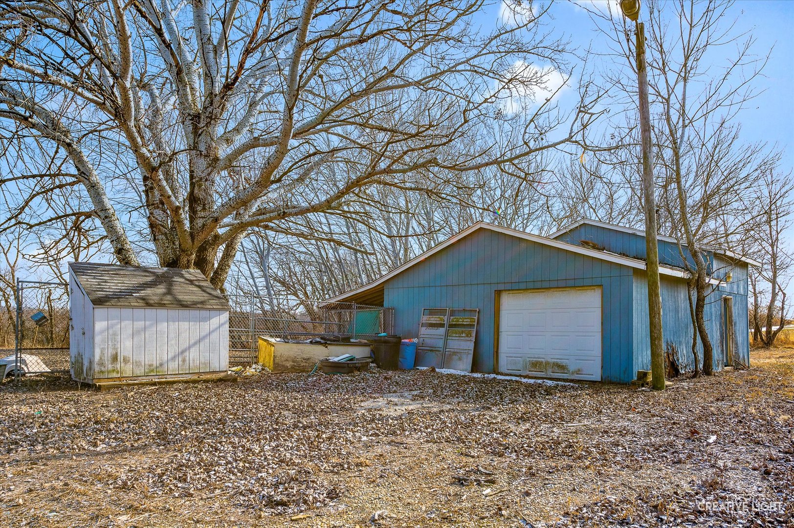 2391 North 24th Road Marseilles, IL 61341 - Photo 2 of 24 a front view of a house with a yard and garage