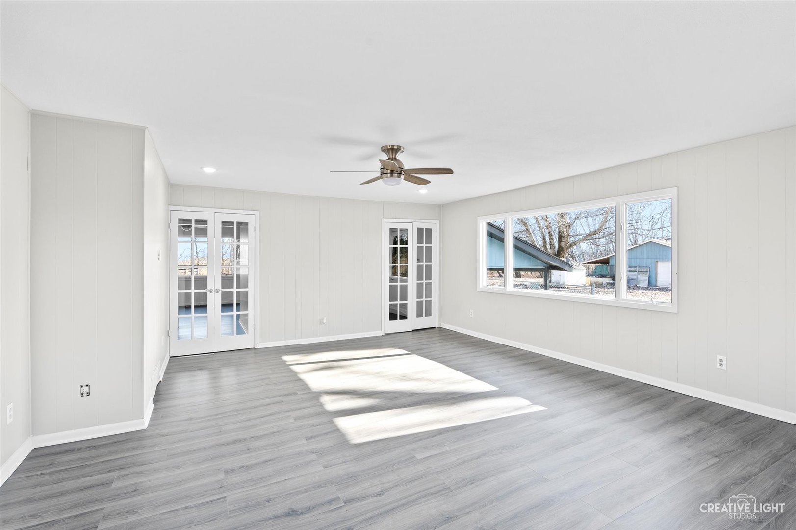 2391 North 24th Road Marseilles, IL 61341 - Photo 5 of 24 a view of an empty room with a window and wooden floor