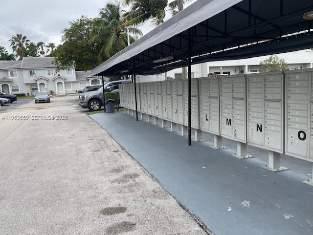 14212 Southwest 121st Place, Unit 6 Miami, FL 33186 - Photo 19 of 19 a view of parking area
