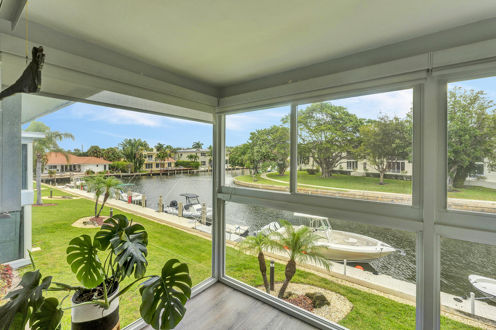 6100 Northeast 7th Avenue, Unit 20 Boca Raton, FL 33487 - Photo 22 of 42 a view of a swimming pool with a porch