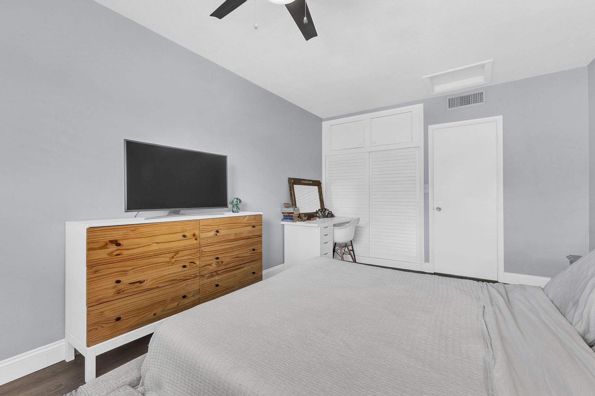 6100 Northeast 7th Avenue, Unit 20 Boca Raton, FL 33487 - Photo 27 of 42 a view of room with flat screen tv