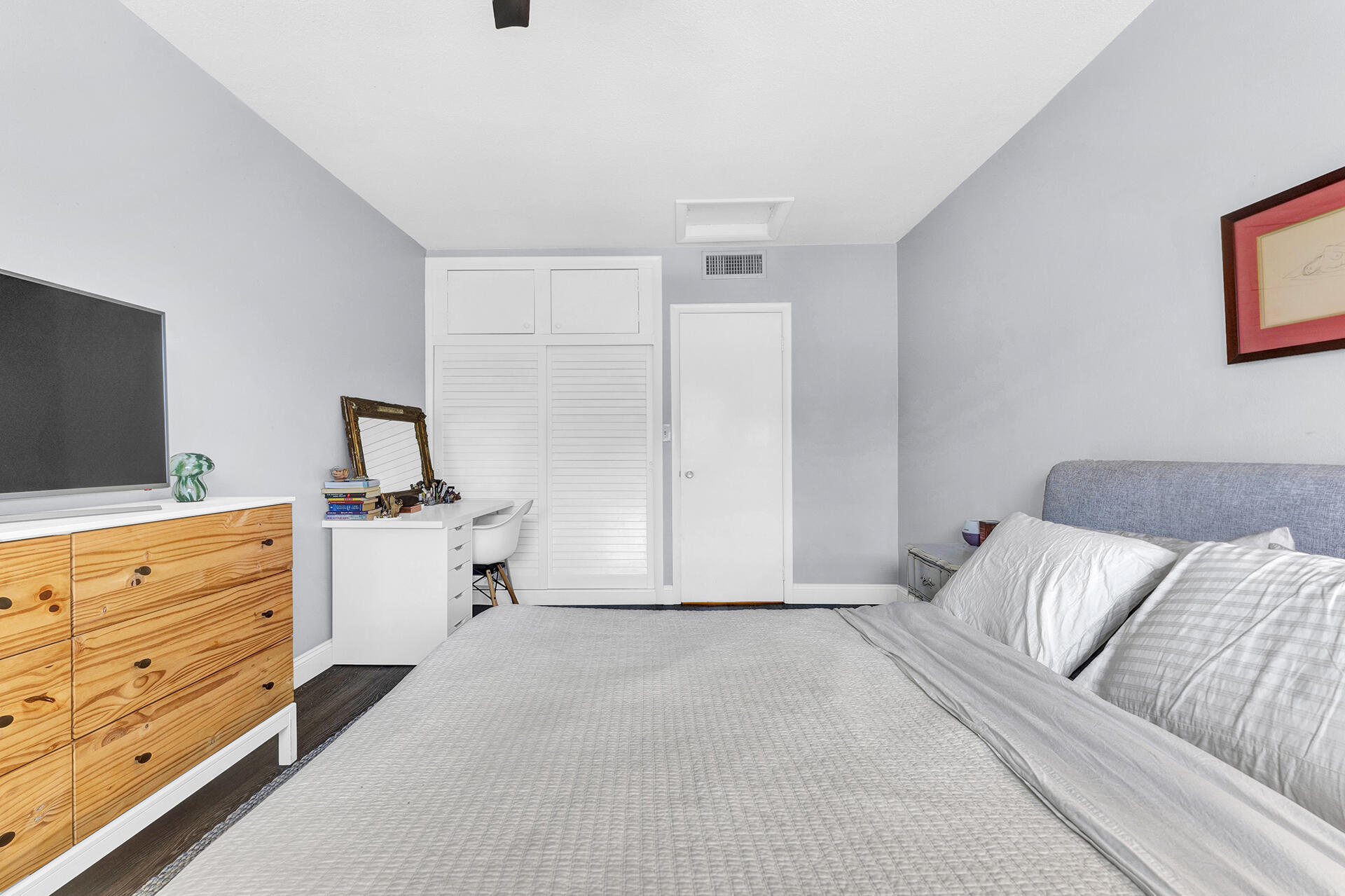 6100 Northeast 7th Avenue, Unit 20 Boca Raton, FL 33487 - Photo 29 of 42 a bed room with a bed and a television