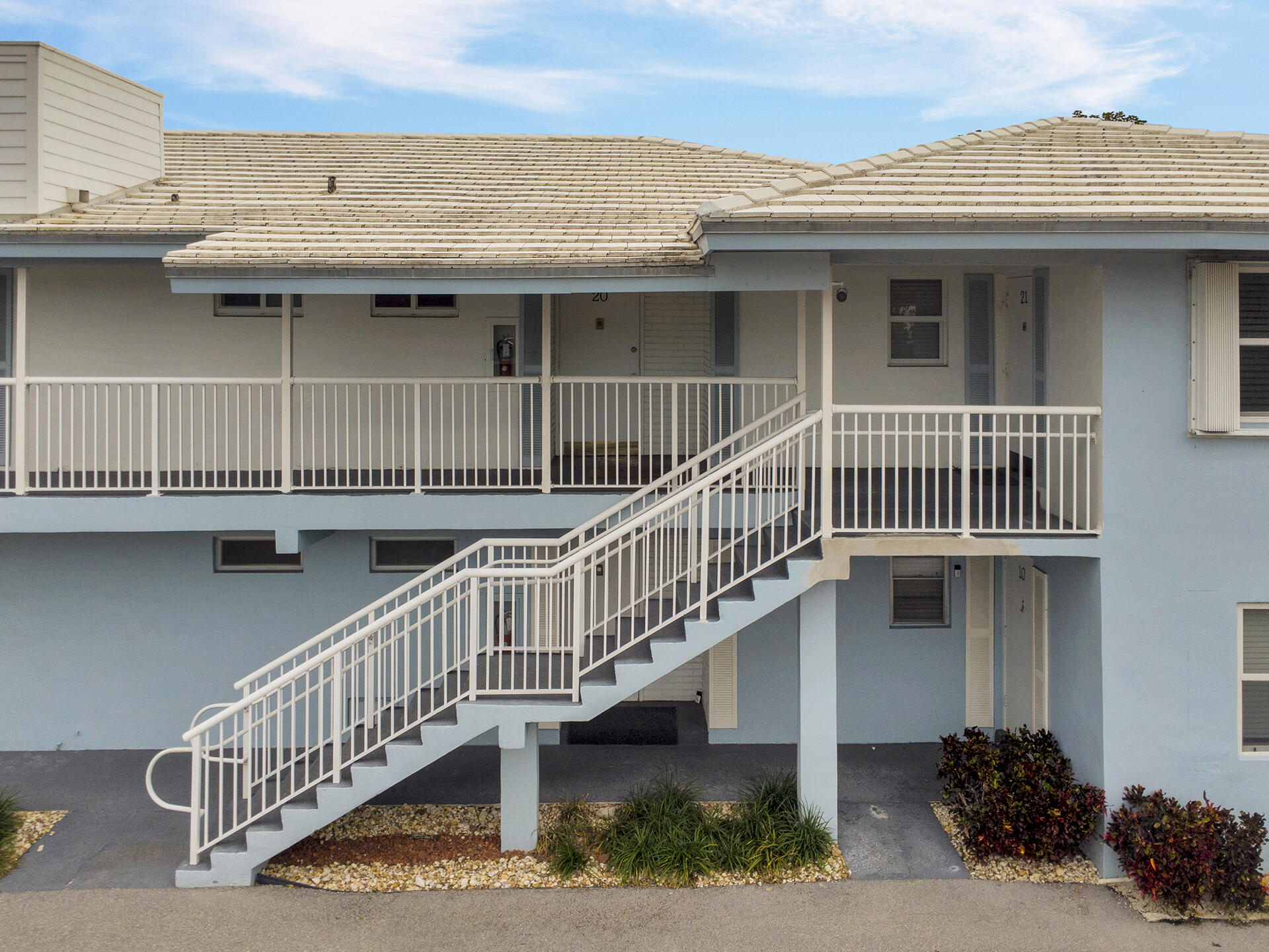 6100 Northeast 7th Avenue, Unit 20 Boca Raton, FL 33487 - Photo 31 of 42 a view of a house with a deck