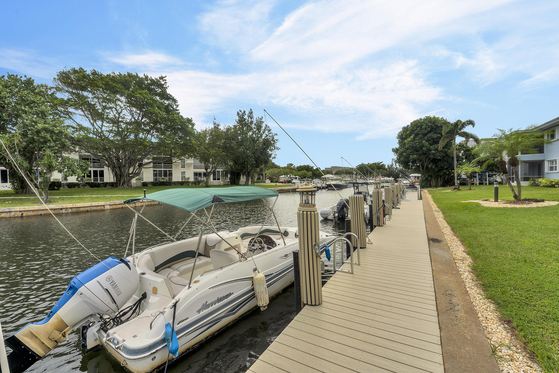 6100 Northeast 7th Avenue, Unit 20 Boca Raton, FL 33487 - Photo 35 of 42 a view of a lake with couches in the patio