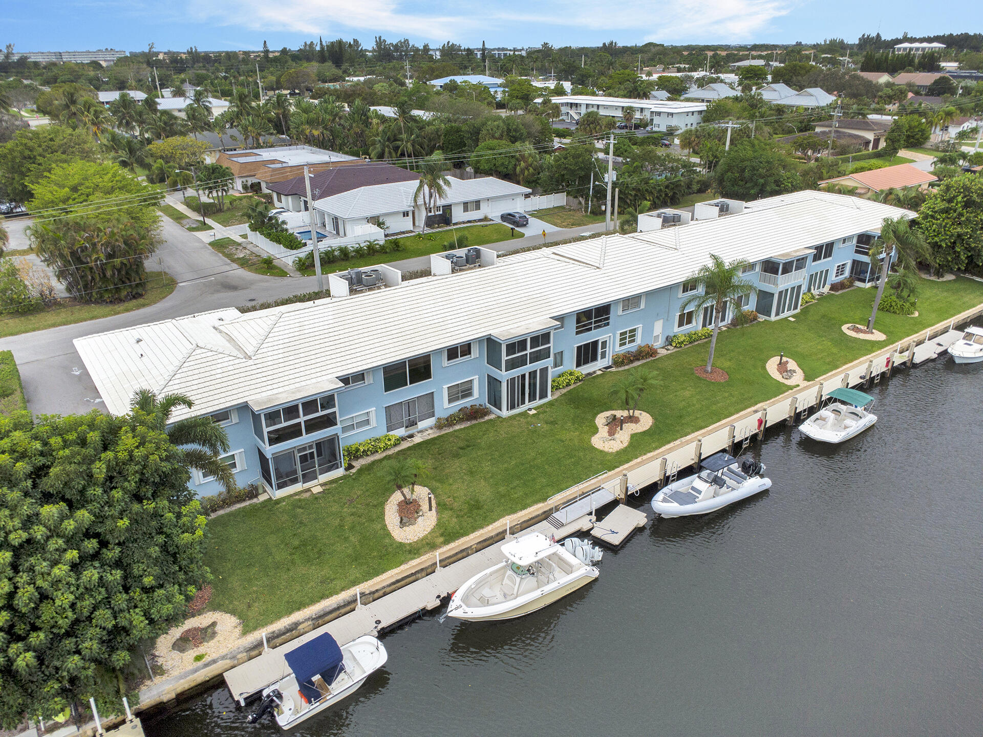 6100 Northeast 7th Avenue, Unit 20 Boca Raton, FL 33487 - Photo 36 of 42 an aerial view of a city with lake