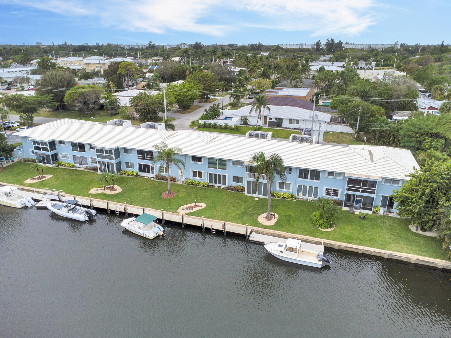 6100 Northeast 7th Avenue, Unit 20 Boca Raton, FL 33487 - Photo 37 of 42 an aerial view of residential house with outdoor space and swimming pool