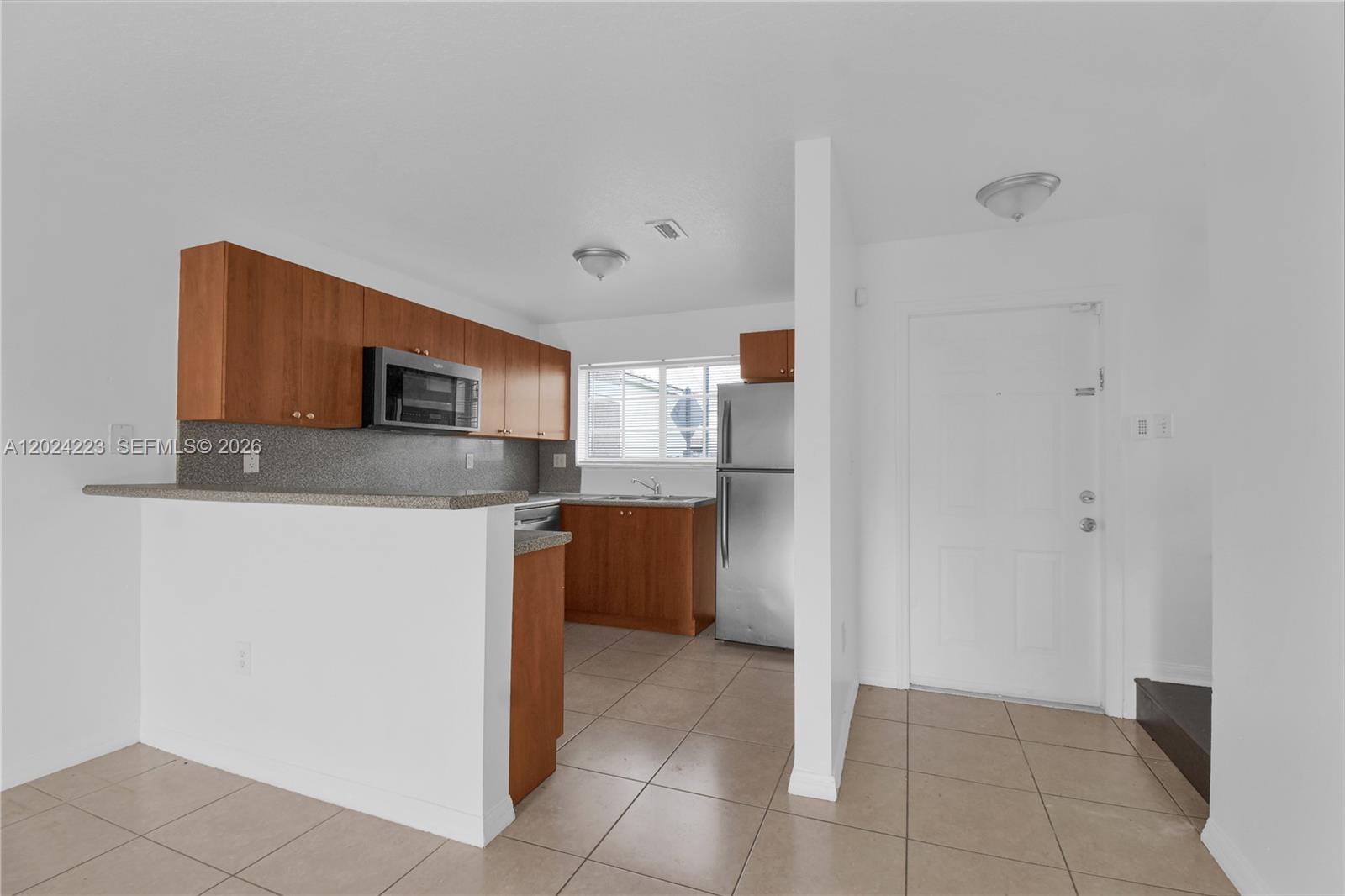 13958 Southwest 260th Street, Unit 101 Homestead, FL 33032 - Photo 7 of 32