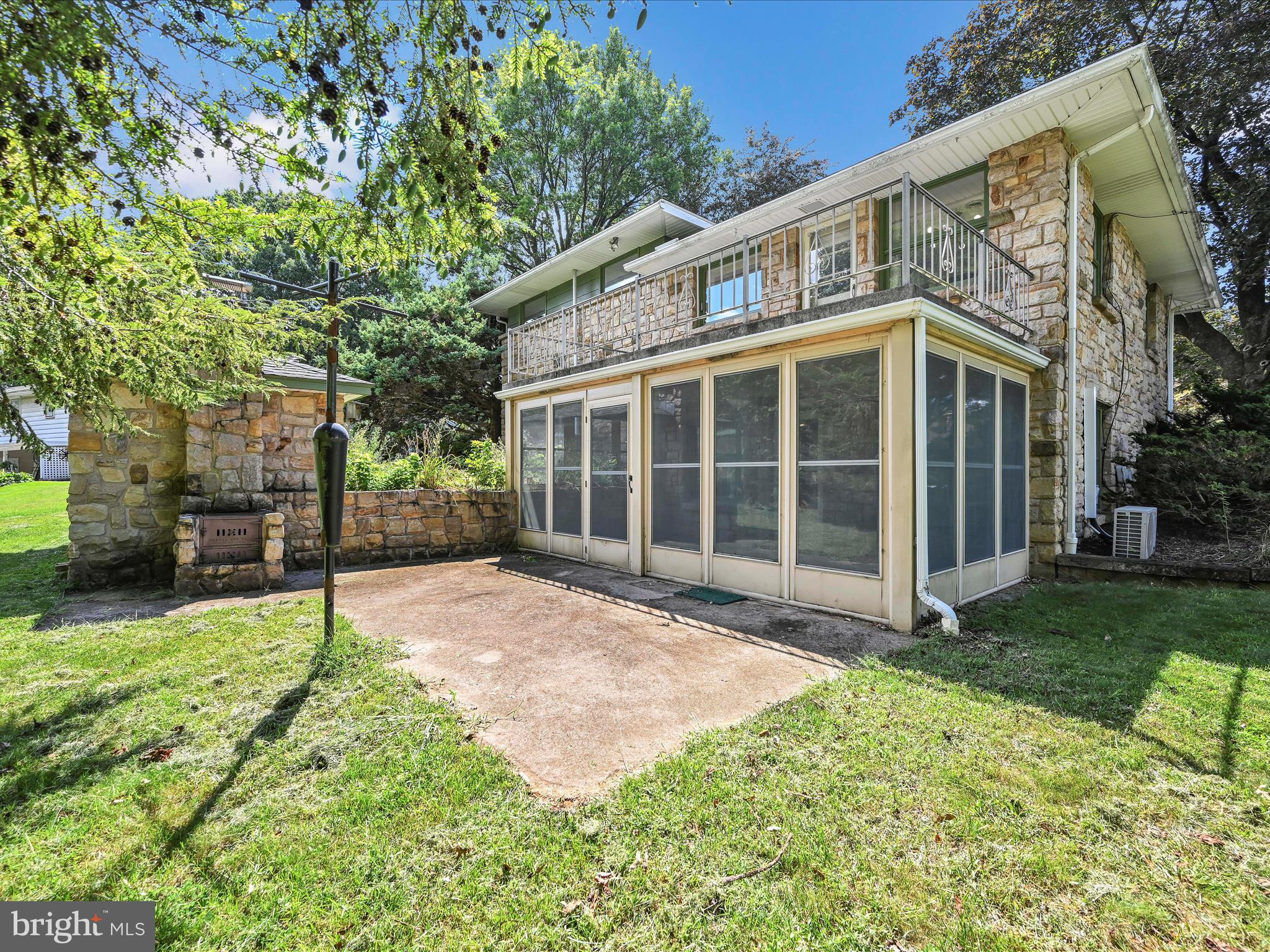 49 Sylvania Road Hershey, PA 17033 - Photo 25 of 29 a view of a house with a yard and a garden