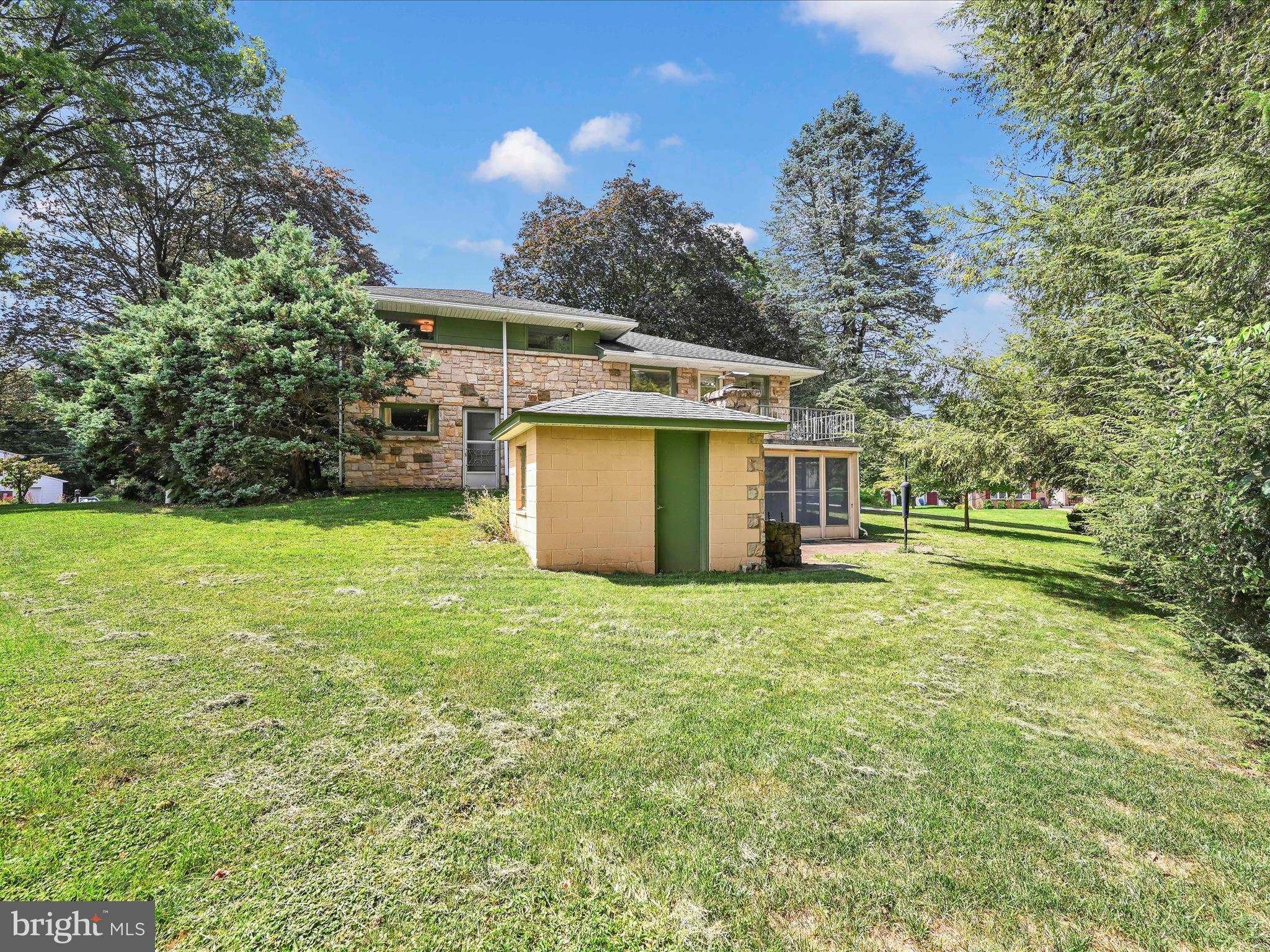 49 Sylvania Road Hershey, PA 17033 - Photo 28 of 29 a view of a house with a backyard