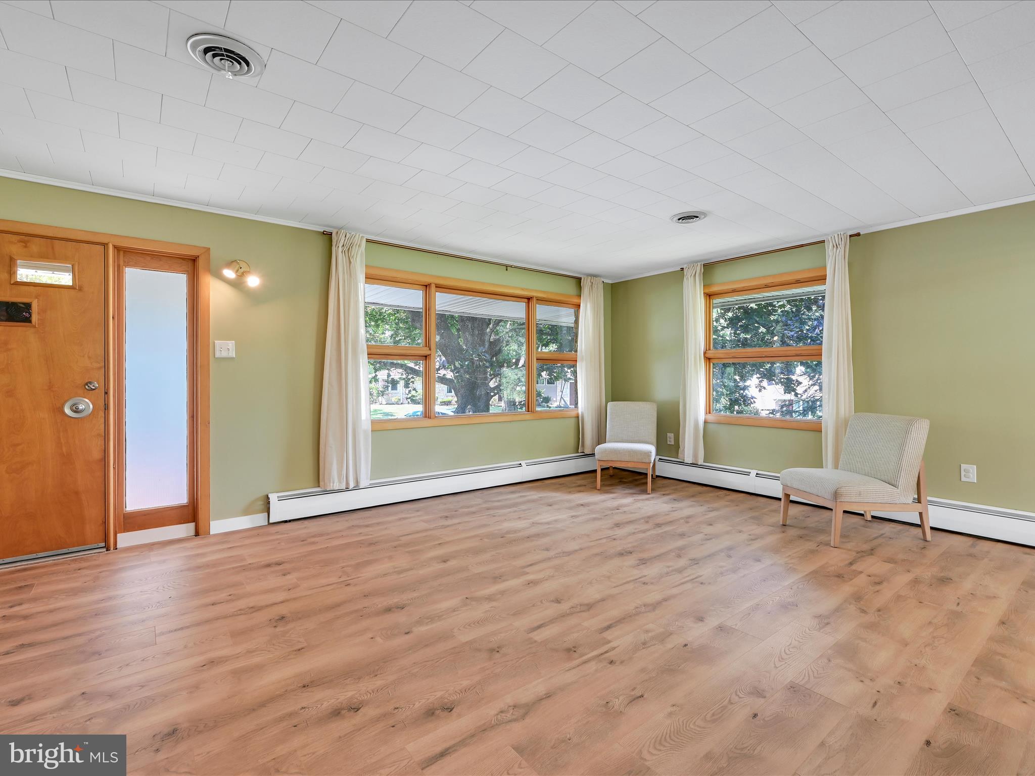 49 Sylvania Road Hershey, PA 17033 - Photo 5 of 29 wooden floor in an empty room with a window