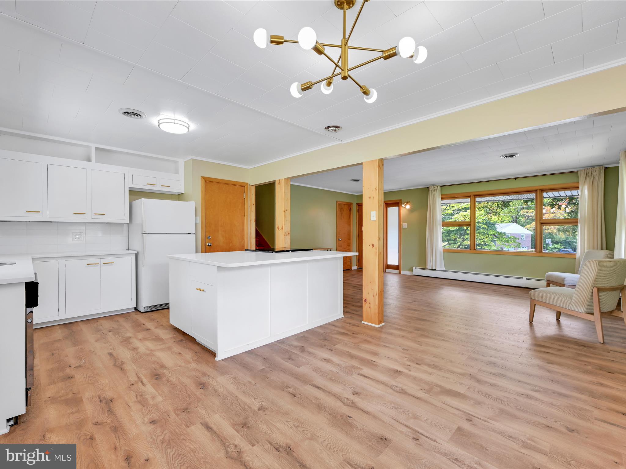 49 Sylvania Road Hershey, PA 17033 - Photo 8 of 29 a view of kitchen with cabinets and wooden floor