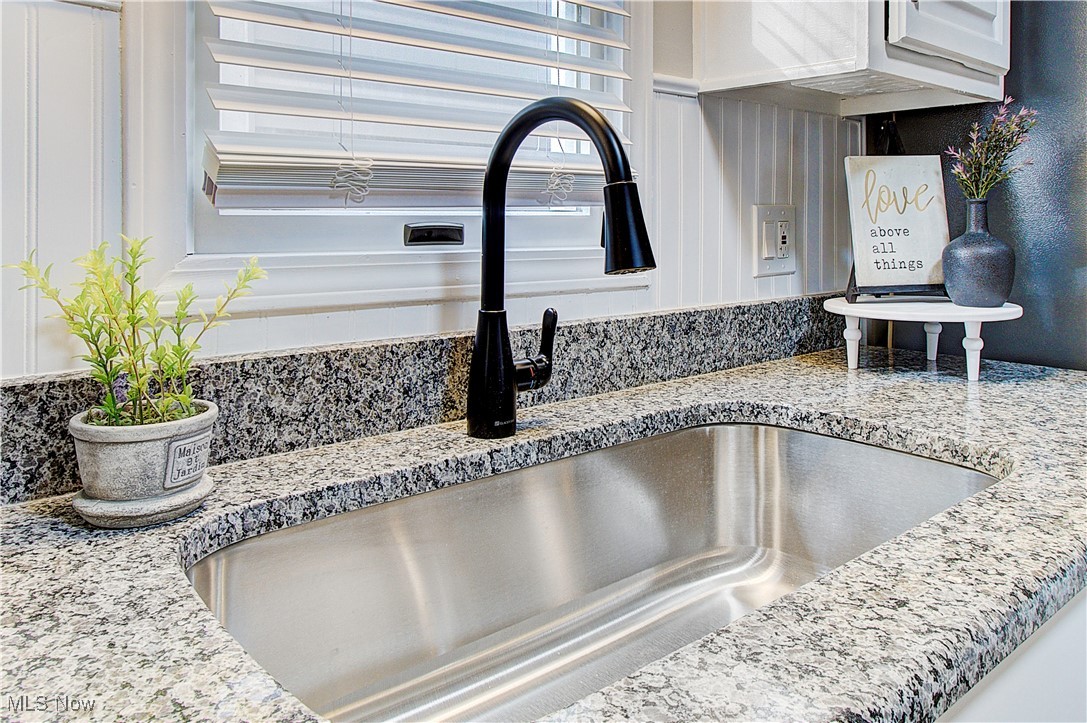 3018 2nd Street Northwest Canton, OH 44708 - Photo 20 of 42 New undernount sink, and again those gorgeous granite countertops.