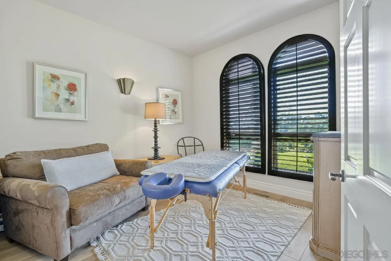 5305 La Crescenta Road Rancho Santa Fe, CA 92067 - Photo 57 of 64 1 of the 2 BR in guest casita being used as a massage area . Paint virtually enhanced to match FR