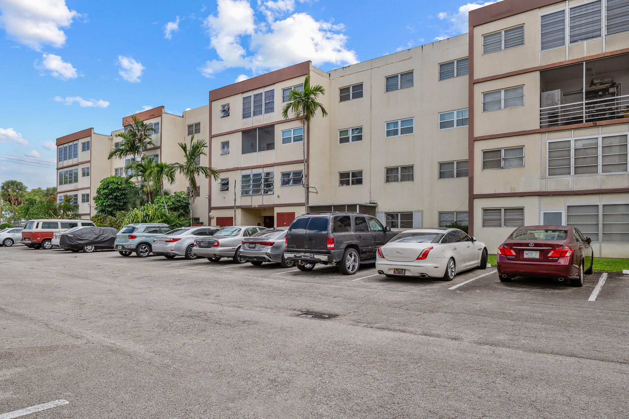 a view of a cars parked in front of a building