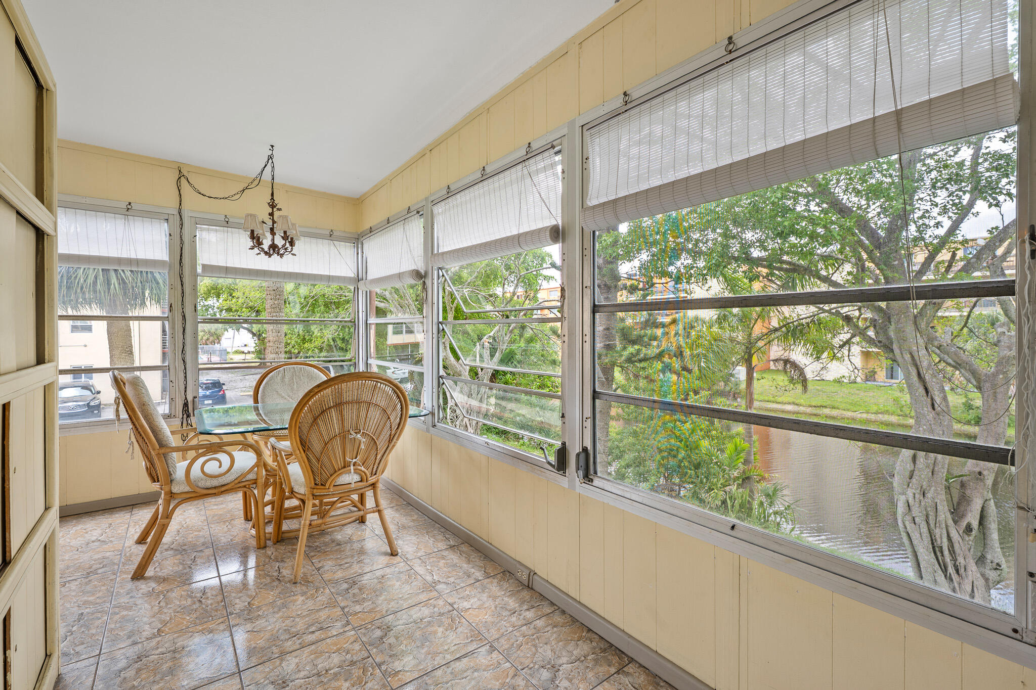 4047 Northwest 16th Street, Unit 206 Lauderhill, FL 33313 - Photo 23 of 26 a view of a room with chairs and balcony