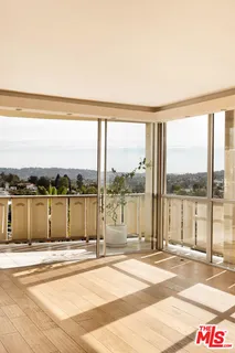 a view of a balcony next to a lake view