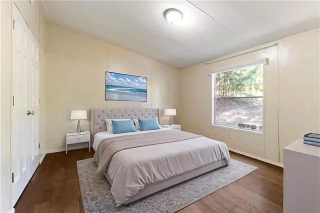 an empty room with wooden floor